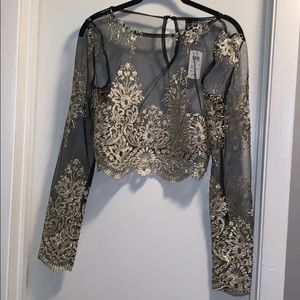 Never worn black and gold crop top